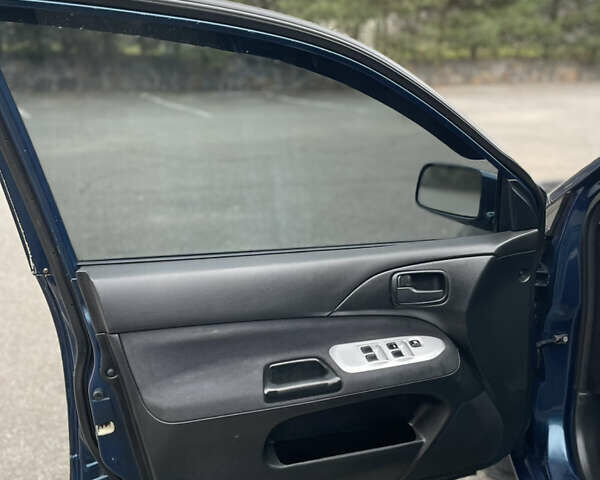 Синий Мицубиси Лансер, объемом двигателя 1.6 л и пробегом 185 тыс. км за 4950 $, фото 17 на Automoto.ua