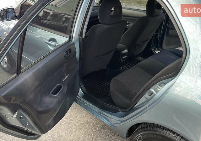 Синій Міцубісі Lancer, об'ємом двигуна 1.58 л та пробігом 210 тис. км за 5300 $, фото 8 на Automoto.ua