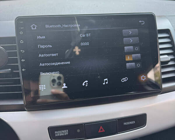 Синий Мицубиси Лансер, объемом двигателя 1.47 л и пробегом 250 тыс. км за 4500 $, фото 13 на Automoto.ua