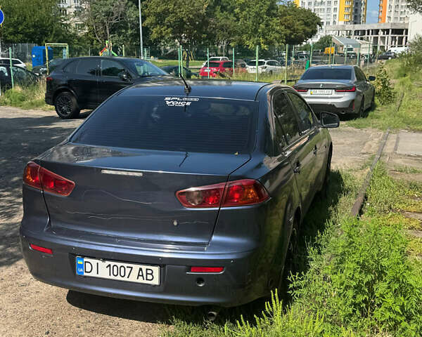 Синий Мицубиси Лансер, объемом двигателя 1.47 л и пробегом 250 тыс. км за 4500 $, фото 4 на Automoto.ua