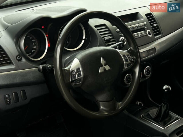 Синій Міцубісі Lancer, об'ємом двигуна 2 л та пробігом 222 тис. км за 5999 $, фото 8 на Automoto.ua