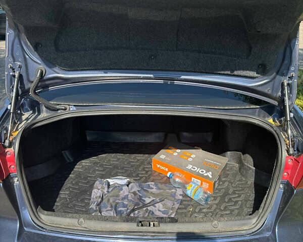 Синий Мицубиси Лансер, объемом двигателя 1.47 л и пробегом 250 тыс. км за 4500 $, фото 9 на Automoto.ua