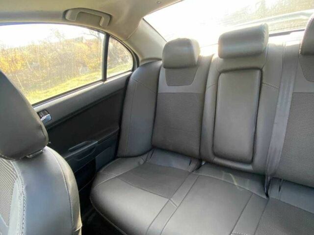 Мицубиси Лансер 2007 в Днепре (Днепропетровске) на Automoto.ua Синий Мицубиси Лансер, объемом двигателя 2 л и пробегом 208 тыс. км за 6400 $, фото 7 на Automoto.ua