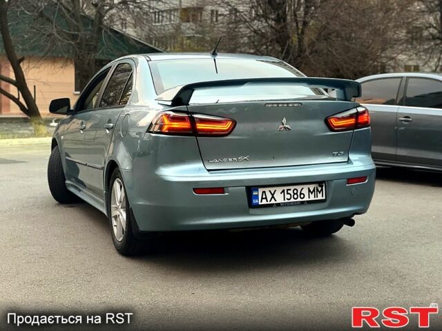 Синій Міцубісі Lancer, об'ємом двигуна 2 л та пробігом 193 тис. км за 6999 $, фото 4 на Automoto.ua