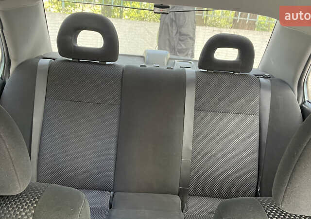 Синій Міцубісі Lancer, об'ємом двигуна 1.58 л та пробігом 210 тис. км за 5300 $, фото 11 на Automoto.ua