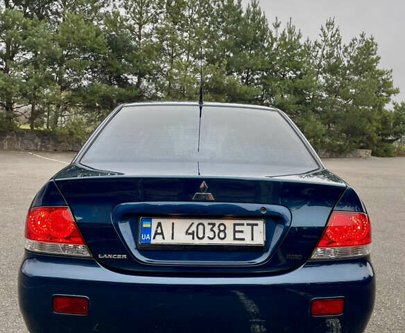 Синий Мицубиси Лансер, объемом двигателя 1.6 л и пробегом 185 тыс. км за 4950 $, фото 11 на Automoto.ua