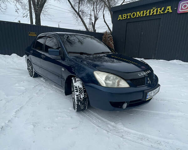 Синий Мицубиси Лансер, объемом двигателя 1.58 л и пробегом 319 тыс. км за 3700 $, фото 2 на Automoto.ua