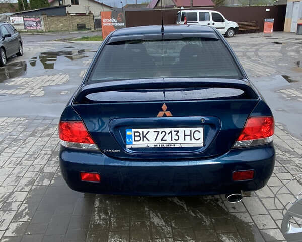 Синій Міцубісі Lancer, об'ємом двигуна 1.6 л та пробігом 245 тис. км за 3500 $, фото 1 на Automoto.ua