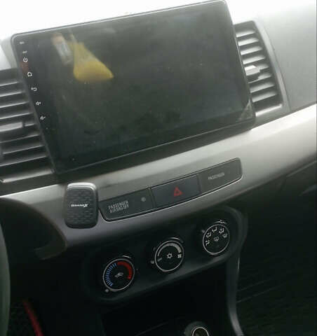 Синий Мицубиси Лансер, объемом двигателя 1.47 л и пробегом 172 тыс. км за 6350 $, фото 6 на Automoto.ua