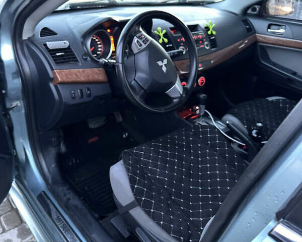 Міцубісі Lancer 2007 у Самборе на Automoto.ua Синій Міцубісі Lancer, об'ємом двигуна 1.5 л та пробігом 201 тис. км за 6000 $, фото 21 на Automoto.ua