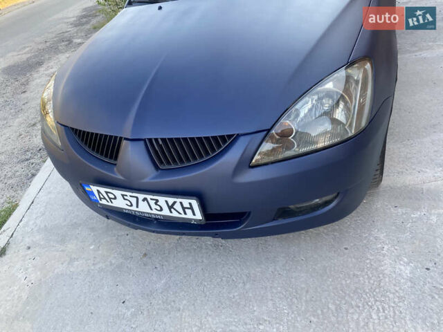Синий Мицубиси Лансер, объемом двигателя 2 л и пробегом 100 тыс. км за 4999 $, фото 7 на Automoto.ua