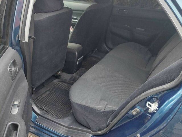 Синий Мицубиси Лансер, объемом двигателя 1.6 л и пробегом 87 тыс. км за 7000 $, фото 6 на Automoto.ua