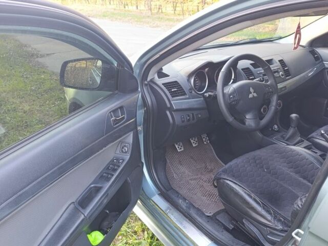 Міцубісі Lancer 2007 у Кременчуге на Automoto.ua Синій Міцубісі Lancer, об'ємом двигуна 2 л та пробігом 160 тис. км за 6500 $, фото 10 на Automoto.ua