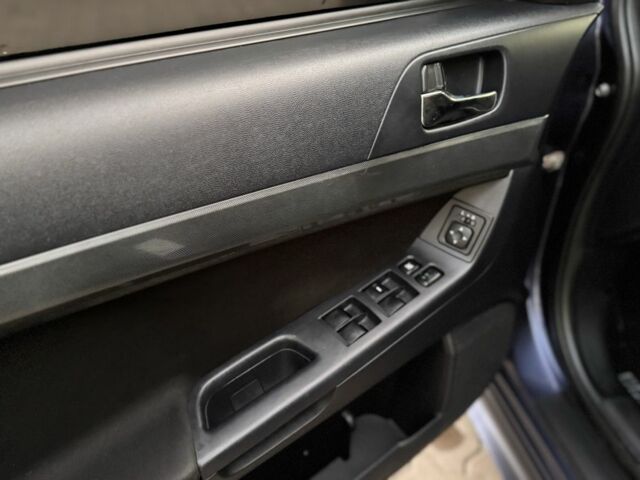 Синій Міцубісі Lancer, об'ємом двигуна 2 л та пробігом 189 тис. км за 7350 $, фото 9 на Automoto.ua