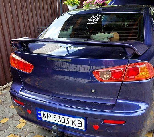 Синій Міцубісі Lancer, об'ємом двигуна 2 л та пробігом 248 тис. км за 5000 $, фото 1 на Automoto.ua