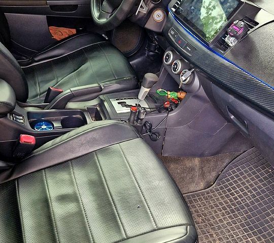 Синій Міцубісі Lancer, об'ємом двигуна 2 л та пробігом 248 тис. км за 5000 $, фото 5 на Automoto.ua