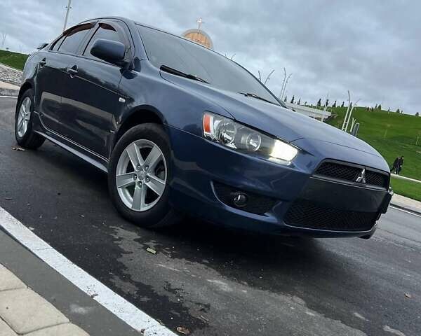 Синій Міцубісі Lancer, об'ємом двигуна 2 л та пробігом 190 тис. км за 6700 $, фото 3 на Automoto.ua