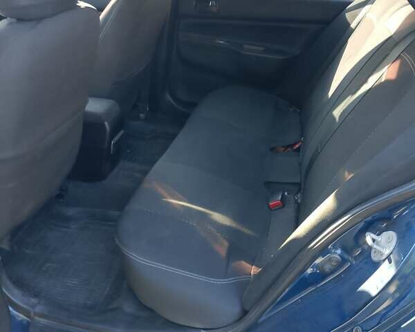 Синій Міцубісі Lancer, об'ємом двигуна 1.58 л та пробігом 317 тис. км за 3600 $, фото 9 на Automoto.ua