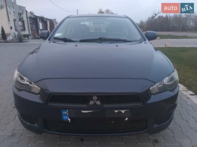Синий Мицубиси Лансер, объемом двигателя 1.5 л и пробегом 260 тыс. км за 5000 $, фото 3 на Automoto.ua