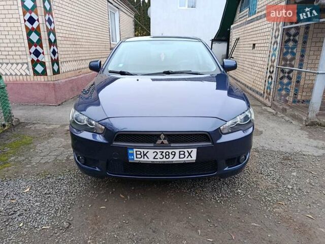 Синий Мицубиси Лансер, объемом двигателя 1.5 л и пробегом 211 тыс. км за 5222 $, фото 3 на Automoto.ua