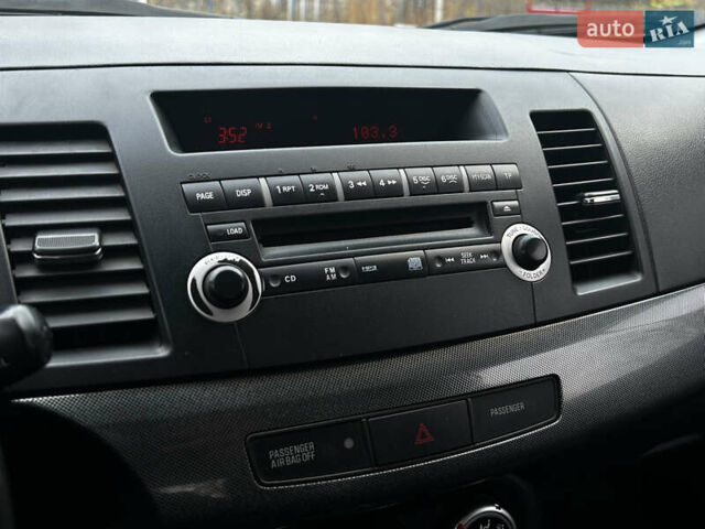 Синій Міцубісі Lancer, об'ємом двигуна 2 л та пробігом 222 тис. км за 5999 $, фото 10 на Automoto.ua