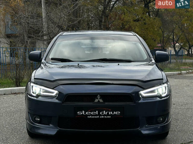 Синій Міцубісі Lancer, об'ємом двигуна 2 л та пробігом 222 тис. км за 5999 $, фото 7 на Automoto.ua