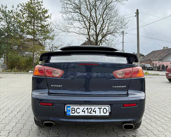 Синий Мицубиси Лансер, объемом двигателя 2 л и пробегом 326 тыс. км за 5650 $, фото 7 на Automoto.ua