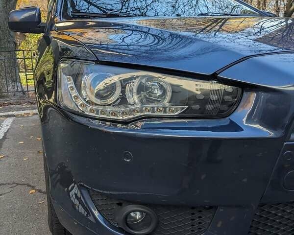 Синий Мицубиси Лансер, объемом двигателя 2 л и пробегом 300 тыс. км за 6250 $, фото 13 на Automoto.ua
