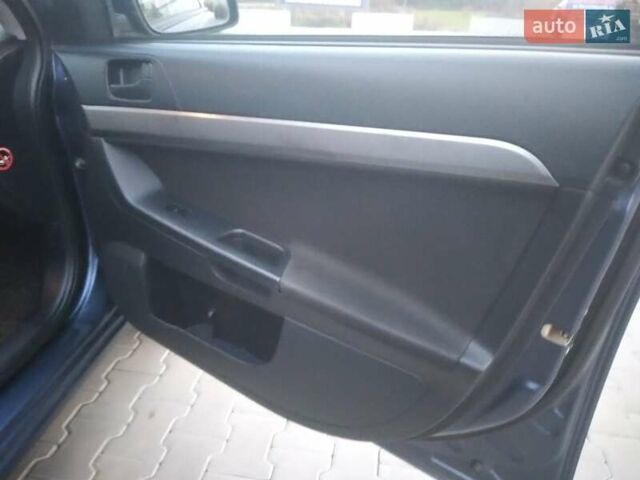 Синий Мицубиси Лансер, объемом двигателя 1.5 л и пробегом 260 тыс. км за 5000 $, фото 9 на Automoto.ua