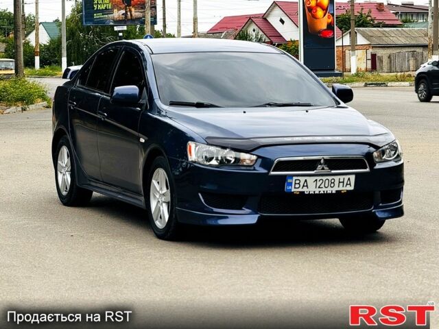 Синий Мицубиси Лансер, объемом двигателя 2 л и пробегом 170 тыс. км за 7500 $, фото 7 на Automoto.ua