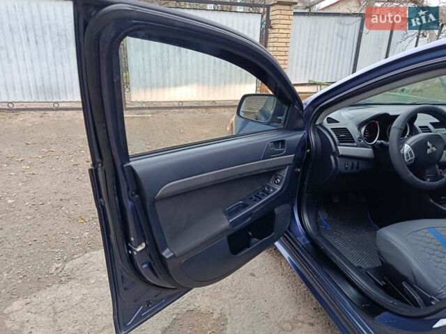 Синий Мицубиси Лансер, объемом двигателя 1.5 л и пробегом 211 тыс. км за 5222 $, фото 19 на Automoto.ua