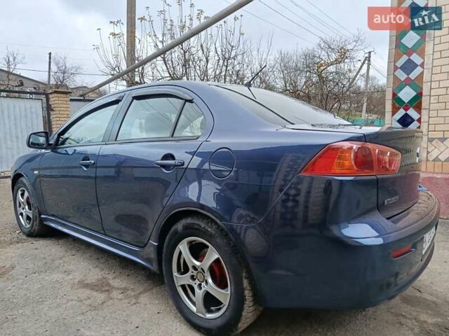 Синий Мицубиси Лансер, объемом двигателя 1.5 л и пробегом 211 тыс. км за 5222 $, фото 12 на Automoto.ua