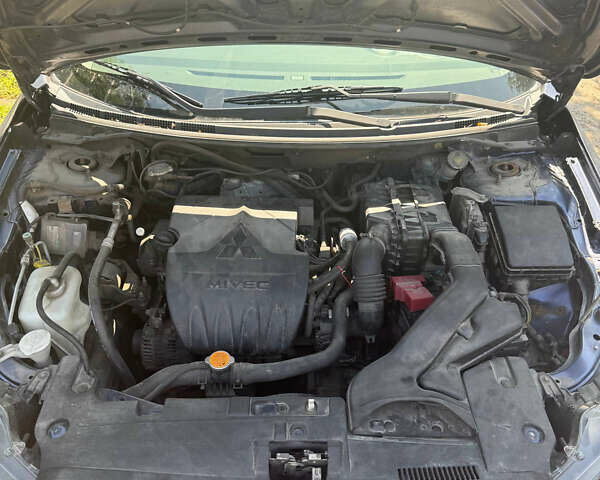 Синий Мицубиси Лансер, объемом двигателя 1.47 л и пробегом 250 тыс. км за 4500 $, фото 12 на Automoto.ua