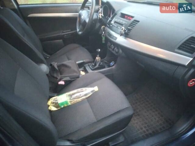 Синий Мицубиси Лансер, объемом двигателя 1.5 л и пробегом 260 тыс. км за 5000 $, фото 16 на Automoto.ua