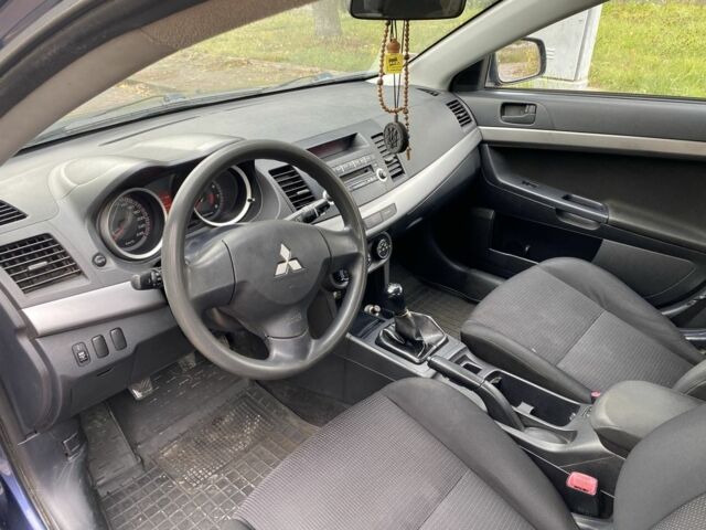 Синий Мицубиси Лансер, объемом двигателя 1.5 л и пробегом 267 тыс. км за 4900 $, фото 4 на Automoto.ua