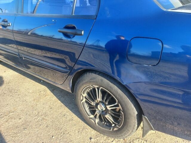 Синій Міцубісі Lancer, об'ємом двигуна 1 л та пробігом 111 тис. км за 3100 $, фото 2 на Automoto.ua