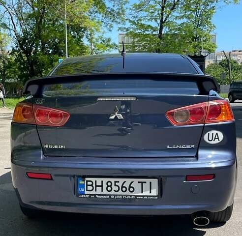 Синій Міцубісі Lancer, об'ємом двигуна 2 л та пробігом 226 тис. км за 6700 $, фото 5 на Automoto.ua