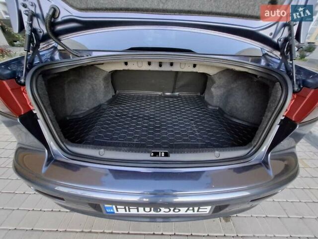 Синій Міцубісі Lancer, об'ємом двигуна 2 л та пробігом 234 тис. км за 6700 $, фото 10 на Automoto.ua