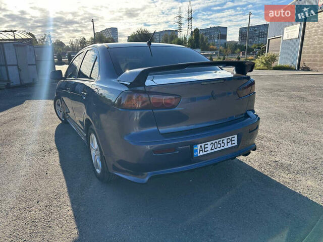 Синій Міцубісі Lancer, об'ємом двигуна 2 л та пробігом 240 тис. км за 6800 $, фото 2 на Automoto.ua