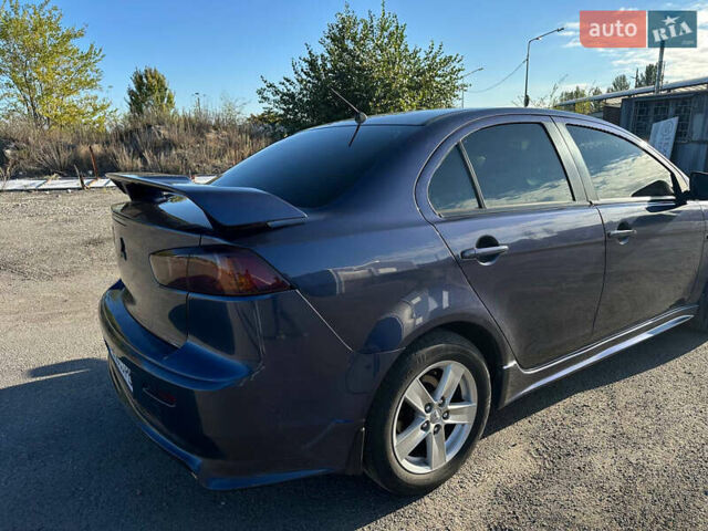Синій Міцубісі Lancer, об'ємом двигуна 2 л та пробігом 240 тис. км за 6800 $, фото 1 на Automoto.ua