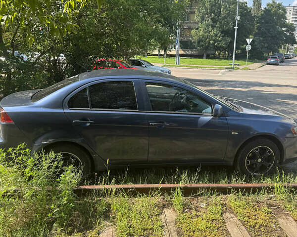 Синий Мицубиси Лансер, объемом двигателя 1.47 л и пробегом 250 тыс. км за 4500 $, фото 6 на Automoto.ua