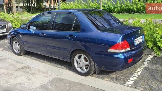 Синій Міцубісі Lancer, об'ємом двигуна 1.6 л та пробігом 198 тис. км за 4800 $, фото 3 на Automoto.ua