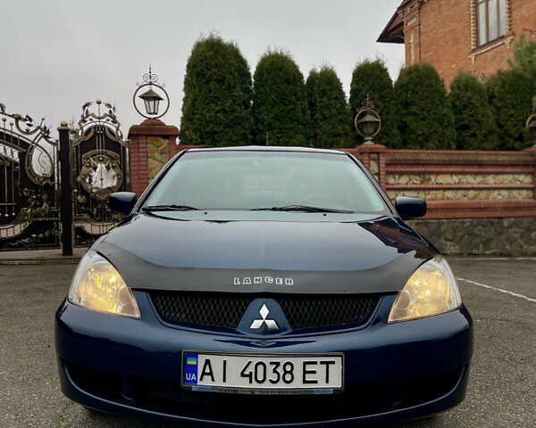 Синий Мицубиси Лансер, объемом двигателя 1.6 л и пробегом 184 тыс. км за 4950 $, фото 1 на Automoto.ua