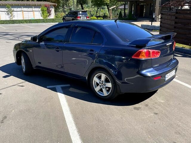 Синій Міцубісі Lancer, об'ємом двигуна 2 л та пробігом 300 тис. км за 5850 $, фото 2 на Automoto.ua