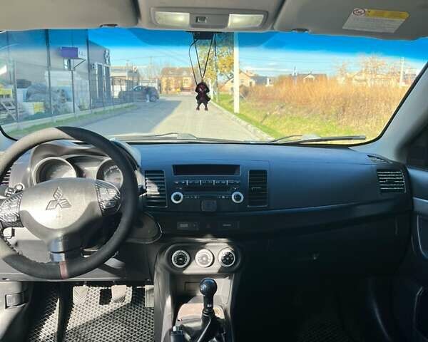 Мицубиси Лансер 2007 в Ивано-Франковске на Automoto.ua Синий Мицубиси Лансер, объемом двигателя 2 л и пробегом 209 тыс. км за 4200 $, фото 6 на Automoto.ua