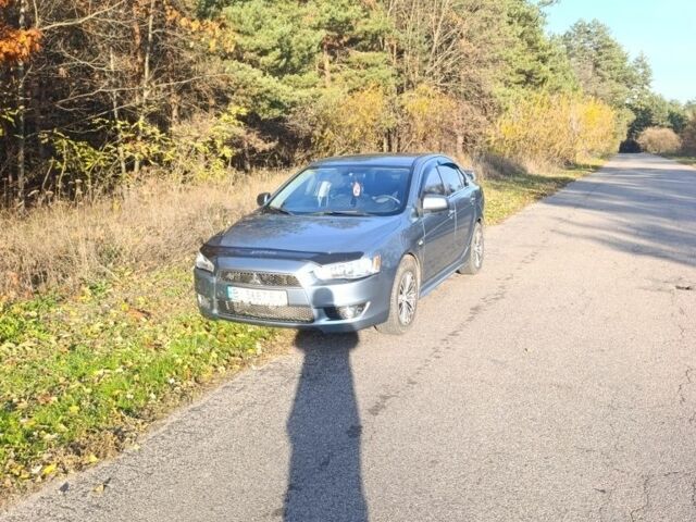 Міцубісі Lancer 2007 у Кременчуге на Automoto.ua Синій Міцубісі Lancer, об'ємом двигуна 2 л та пробігом 160 тис. км за 6500 $, фото 7 на Automoto.ua