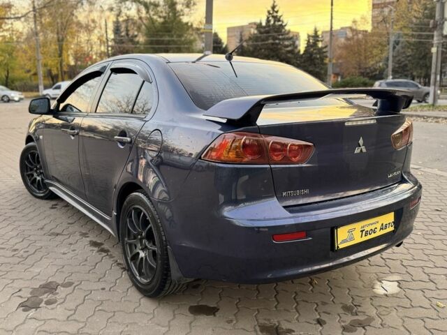 Синій Міцубісі Lancer, об'ємом двигуна 2 л та пробігом 189 тис. км за 7350 $, фото 3 на Automoto.ua