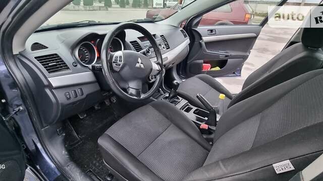 Синій Міцубісі Lancer, об'ємом двигуна 1.5 л та пробігом 206 тис. км за 5700 $, фото 6 на Automoto.ua