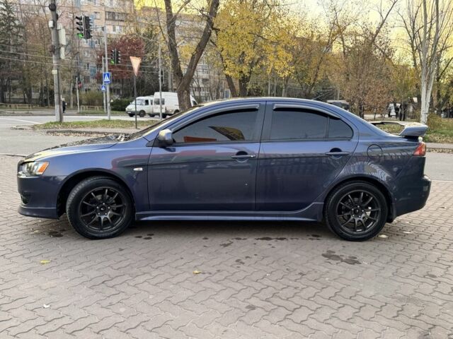 Синій Міцубісі Lancer, об'ємом двигуна 2 л та пробігом 189 тис. км за 7350 $, фото 2 на Automoto.ua