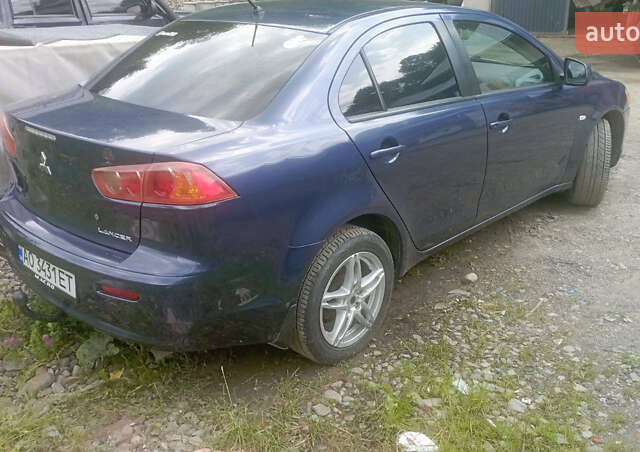 Синий Мицубиси Лансер, объемом двигателя 1.47 л и пробегом 172 тыс. км за 6350 $, фото 2 на Automoto.ua